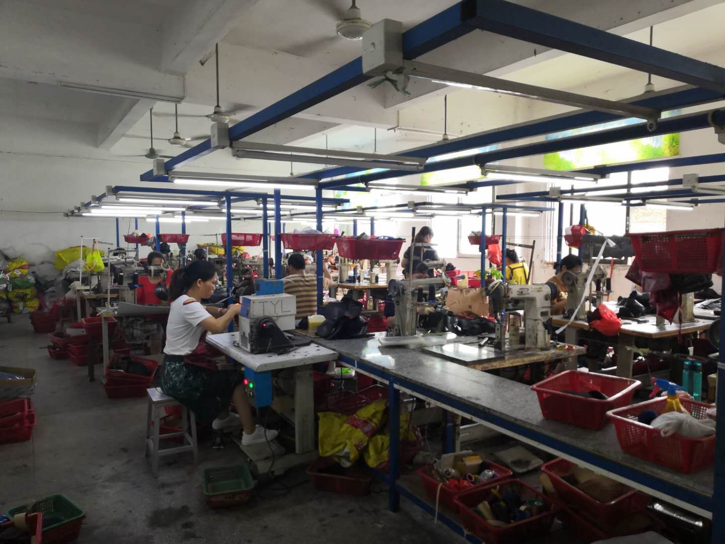 alt="Shoe Manufacturing Process"